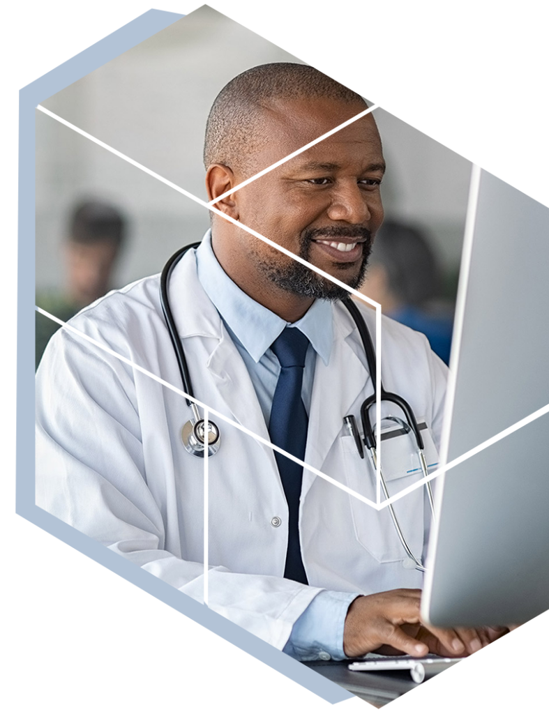 Black male doctor using computer
